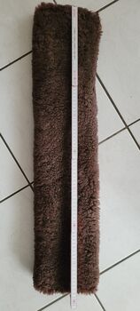 Gebrauchter Lammfellsattelgurtüberzug