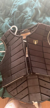 Riding helmet size medium and riding vest size XL