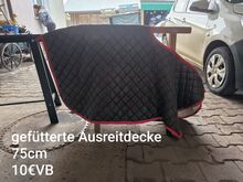 Gefütterte Ausreitdecke