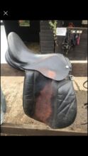 Small brown leather saddle