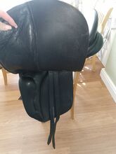 Black dressage saddle